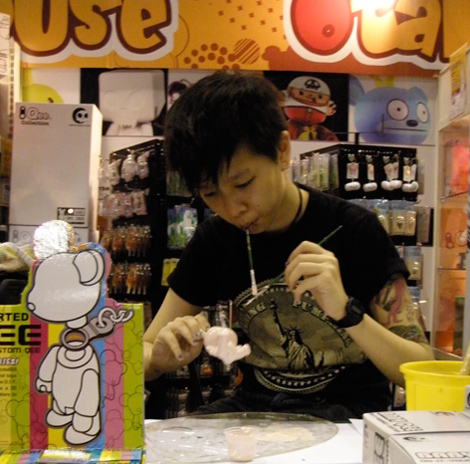 Gwen hard at work at Otaku House Booth Gwen hard at work at Otaku House Booth
